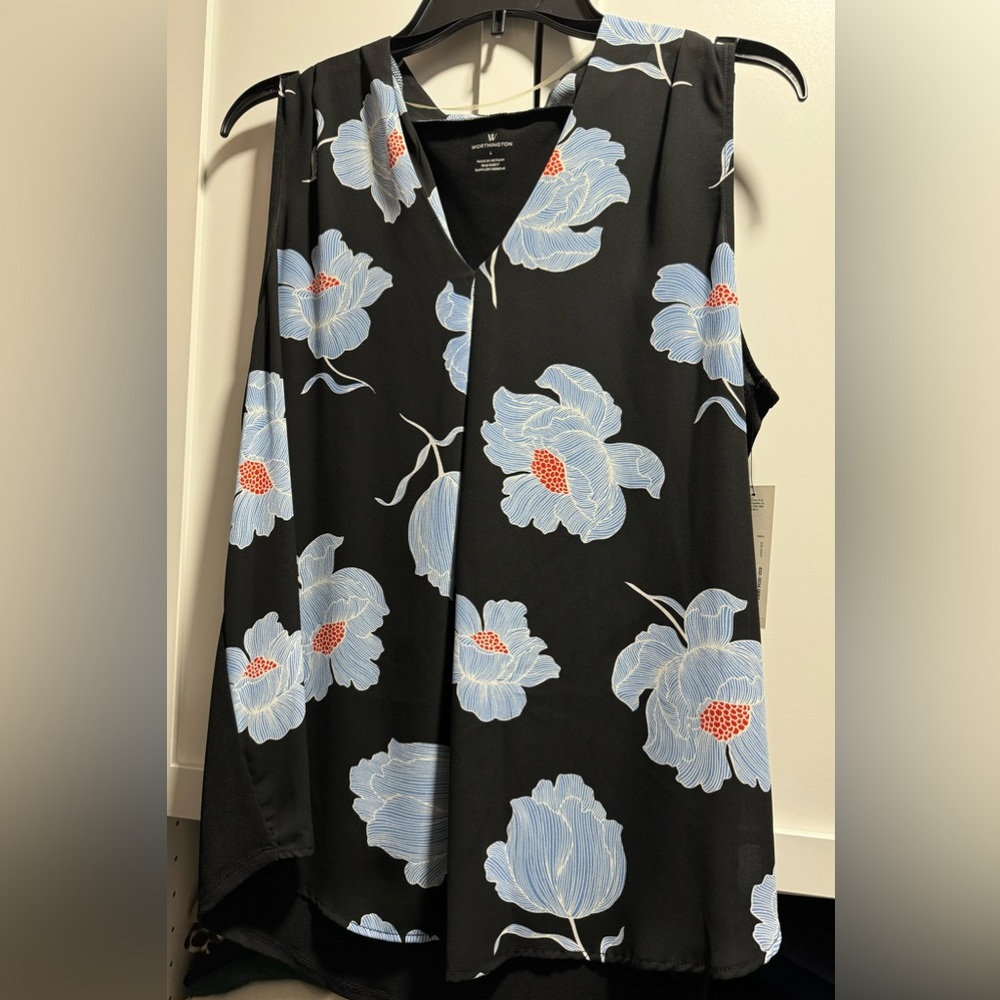 Floral blouse in front black back no sleeves